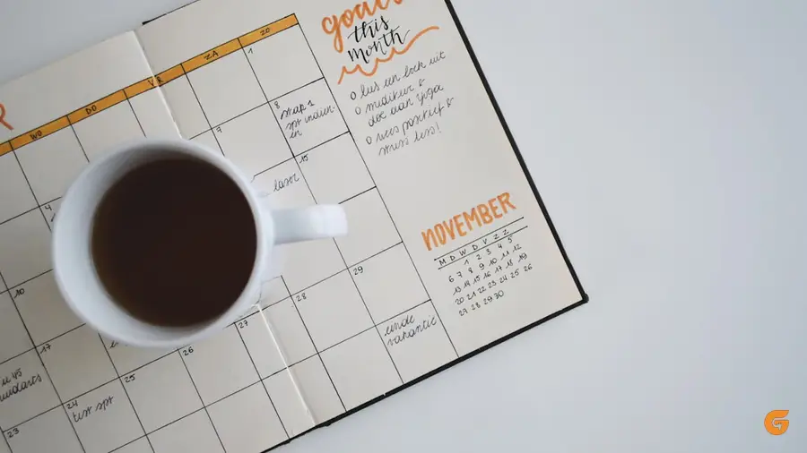 A planner and calendar on a desk