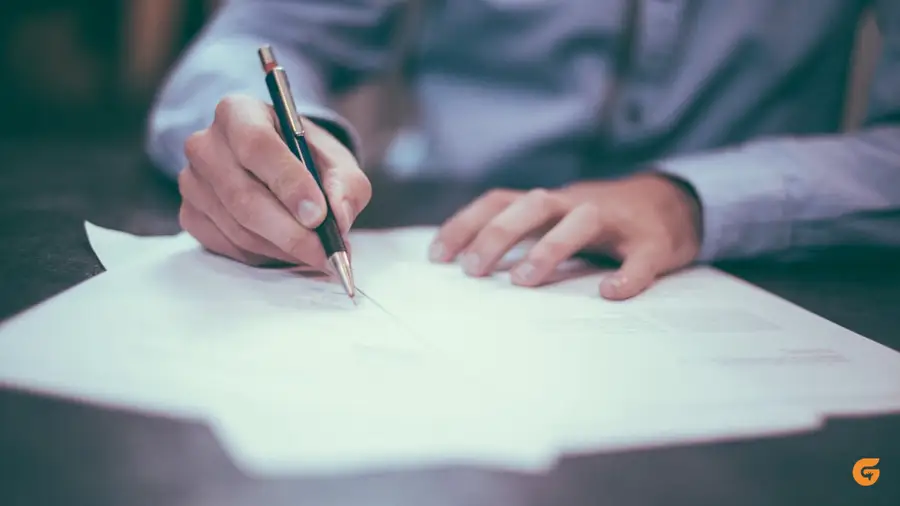 Signing a document with a fountain pen