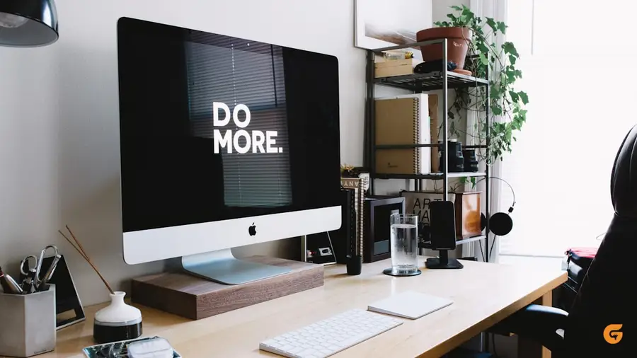 A tidy desk with a computer