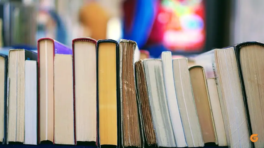 Open books stacked on a table